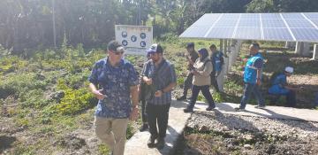 Delegates visiting the solar power plant.
