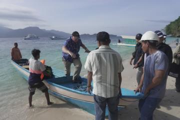 Ambassador Austin and the Joint Delegation arrive at Pulau Tiga, the site of a solar mini-grid refurbishment project near Ambon.
